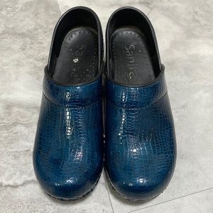 Blue snakeskin nursing clogs